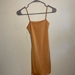 Fashion Nova tight orange dress with a lace back.